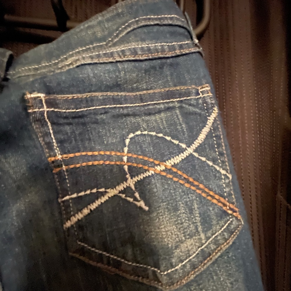 So dark blue boot cut jeans
